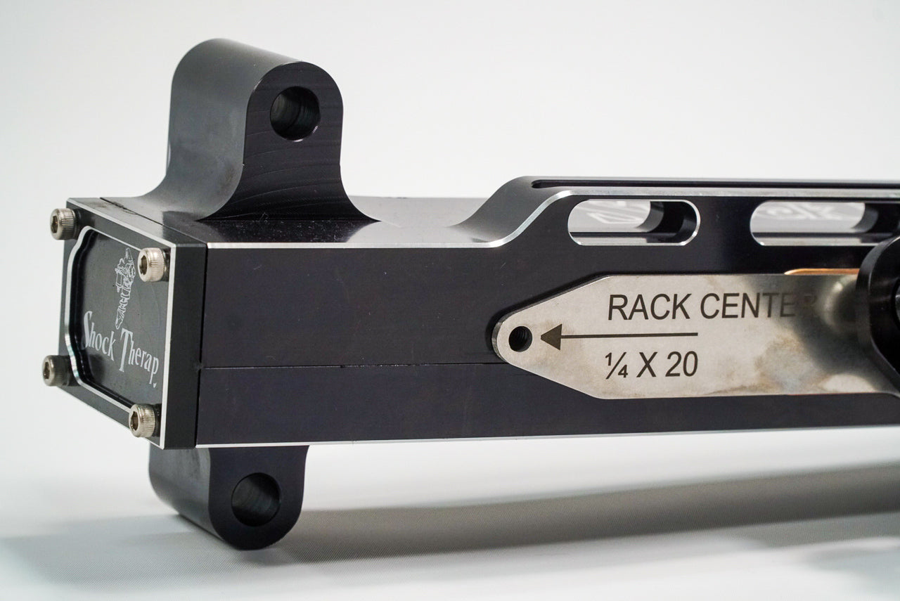 Rack center bolt to locate the rack centered during alignments